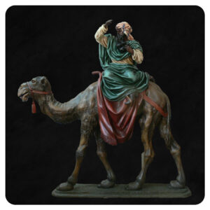 Figura do szopki, pasterz na wielbłądzie, drewniana rzeźba