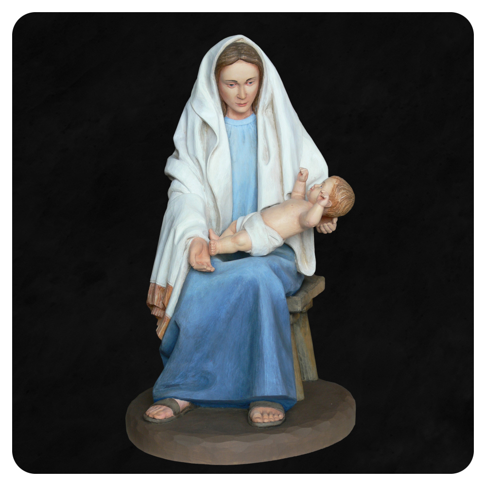 Figura Maryi z szopki bożonarodzeniowej, Matka Boża trzymająca dzieciątko na rękach na czarnym tle