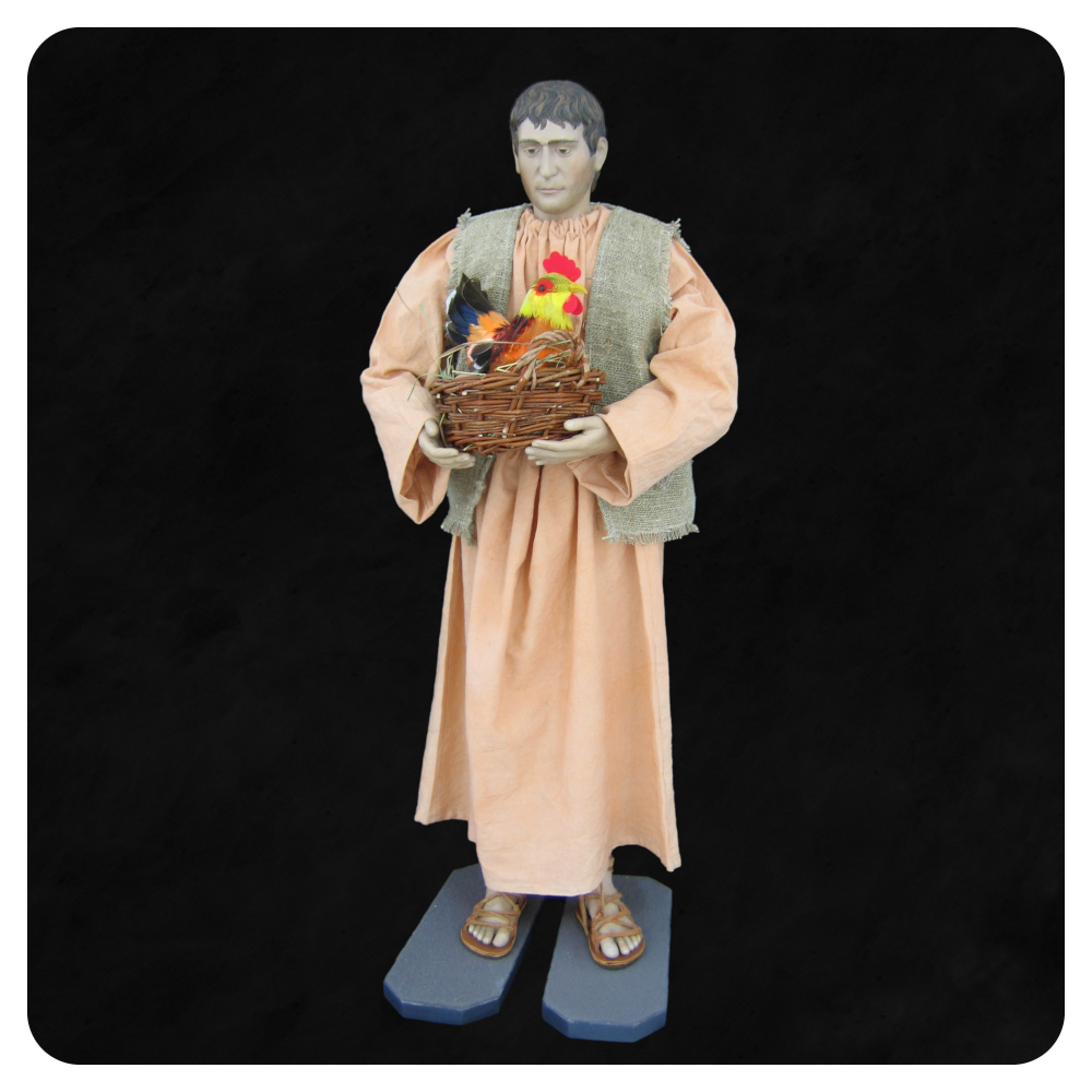 Pasterz do szopki trzymający koszyk